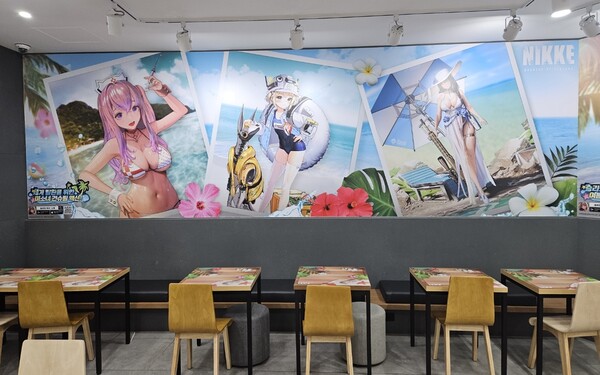 - 벽에도 해변 배경으로 포즈를 취하는 니케 일러스트가